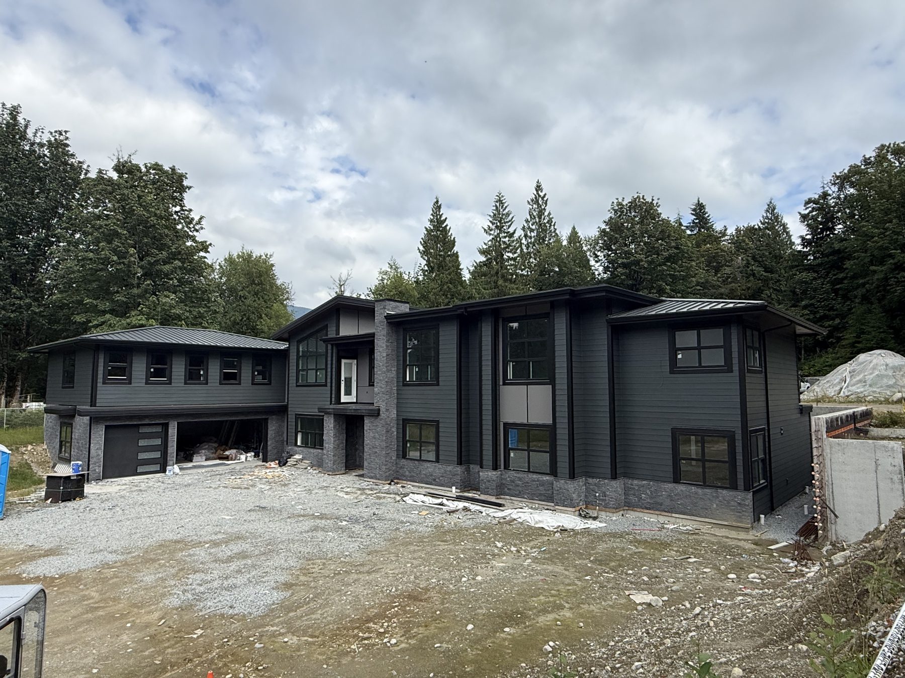 Dark lap siding on a custom home